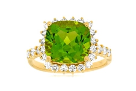 A halo peridot fashion ring from Albert’s Diamond Jeweler’s in-house collection.