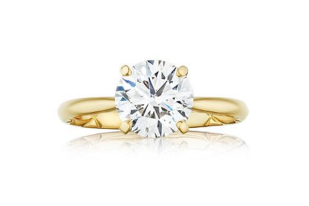 A stunning yellow gold solitaire engagement ring from A. JAFFE, available at Albert’s Diamond Jewelers.