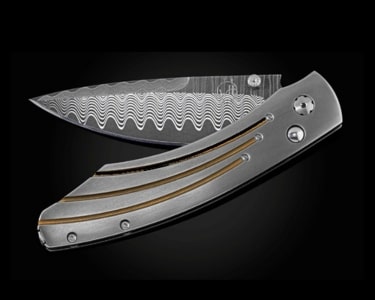 A pocket knife with a unique Damascus blade from William Henry.