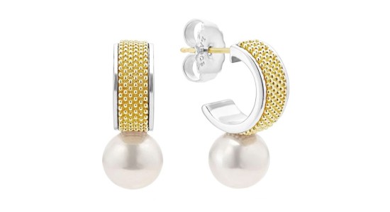 a pair of mixed metal huggie earrings with pearls