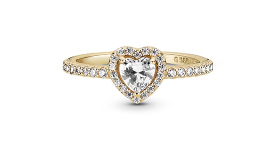 a yellow gold fashion ring with a heart shaped diamond