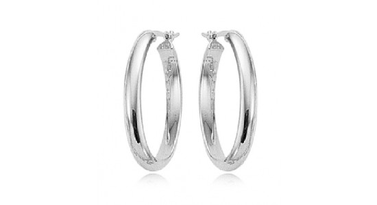 A pair of thick, silver hoop earrings from Albert’s in-house collection