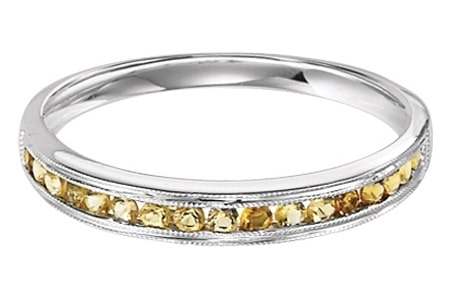 A channel-set citrine fashion ring is paired with 10k white gold