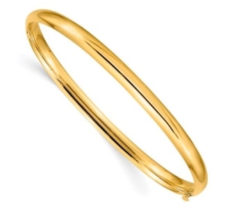 A simple gold bangle bracelet is an ideal piece to engrave a message