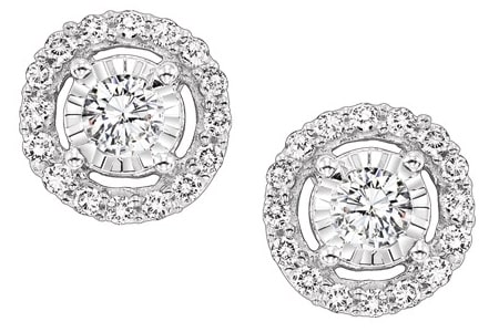 A pair of halo diamond studs from Albert’s Diamond Jewelers in-house collection.