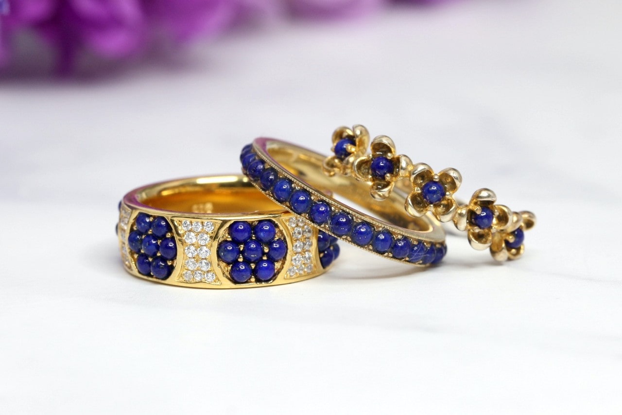 Yellow gold, sapphire, and diamond rings of varying sorts.