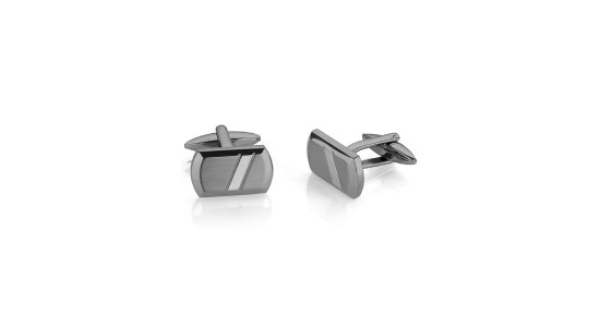 Pair of silver cufflinks of an irregular shape against a white background.