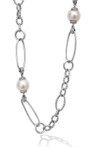 A Lagos chain pearl necklace features an intricate chain with caviar detailing