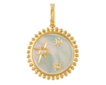 A pendant from Doves by Doron Paloma features mother-of-pearl