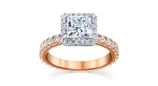 a mixed metal engagement ring featuring a princess cut center stone and diamond halo