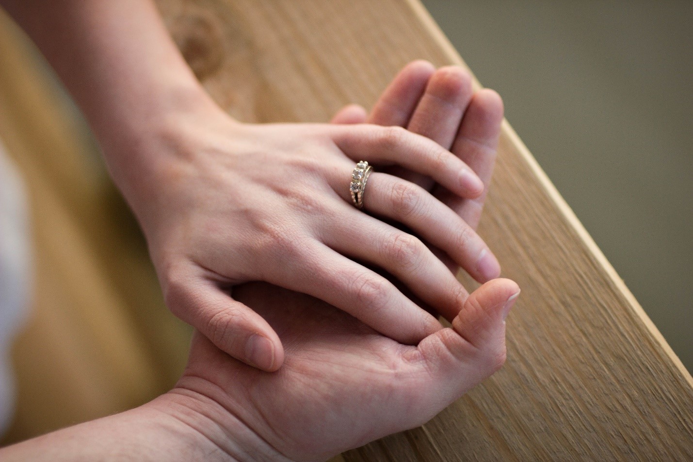 Three stone engagement rings symbolize the shared 